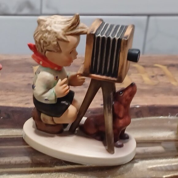 4 Hummel Boys with an animal - Picture 3 of 9